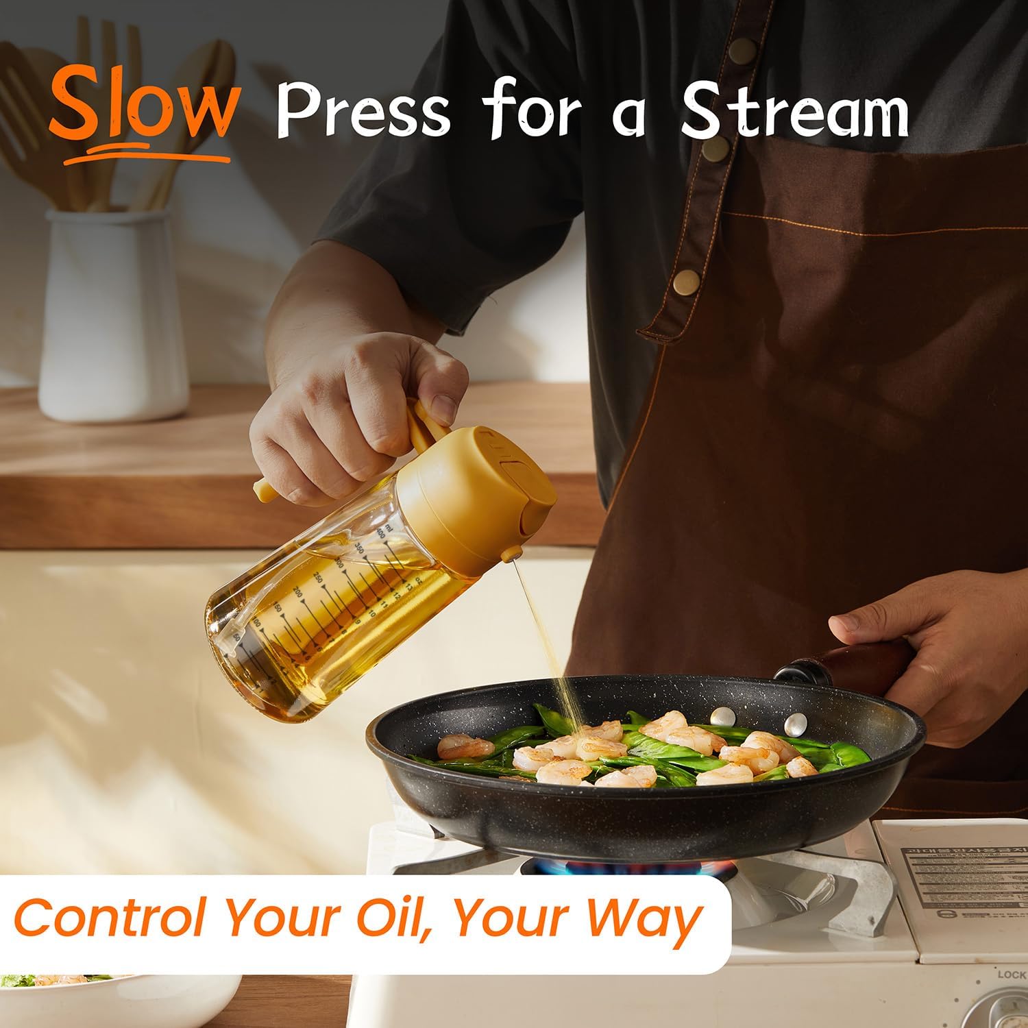 Air fryer with yellow Zorli sprayer in action