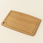 Odriva cutting board in use with chopped vegetables